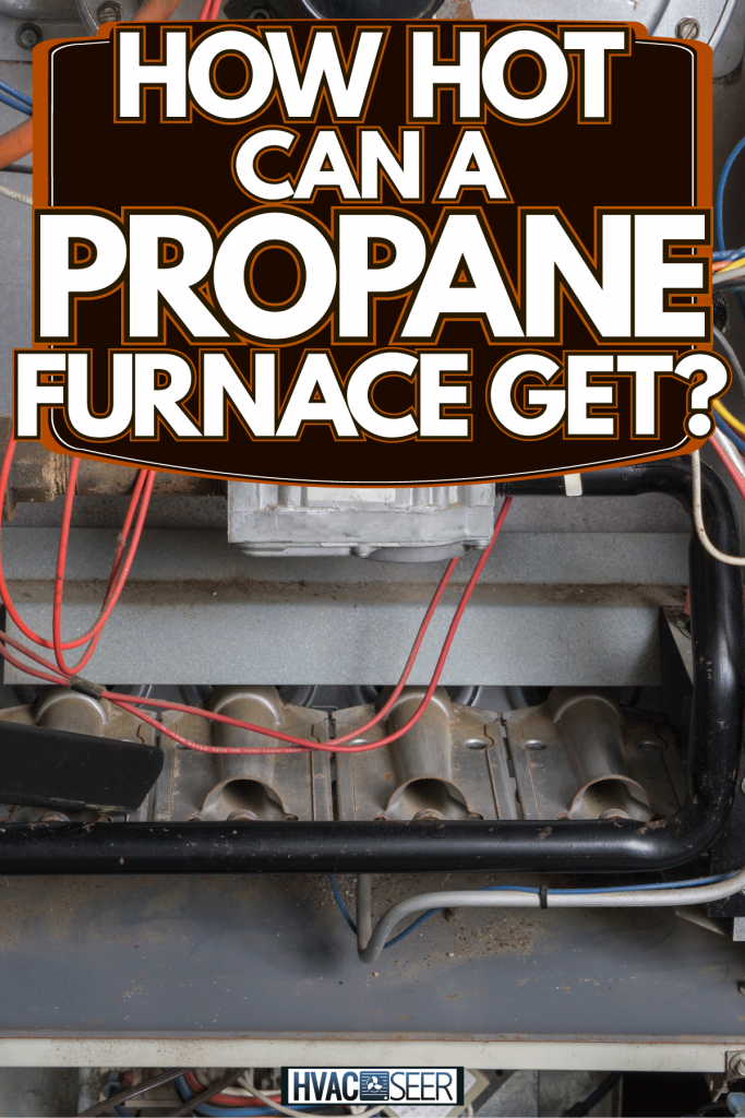 Technician cleaning the furnace, How Hot Can A Propane Furnace Get?