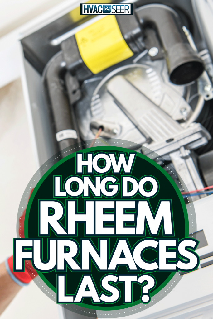 A technician checking the furnace, How Long Do Rheem Furnaces Last?