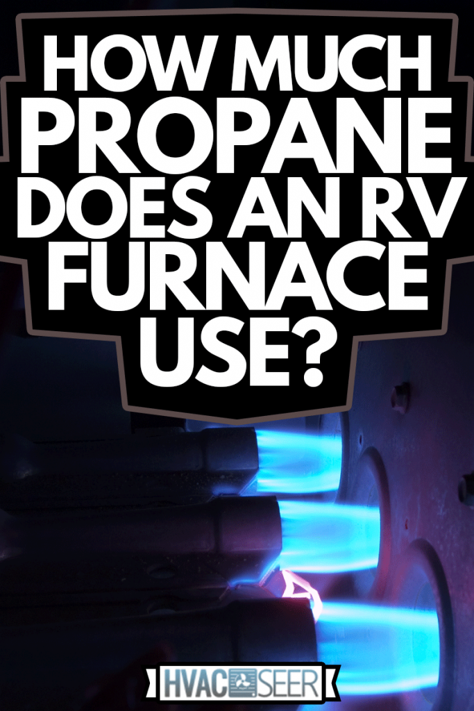 How Much Propane Does An RV Furnace Use?, Three natural gas burners with bright blue flames inside an operating gas furnace