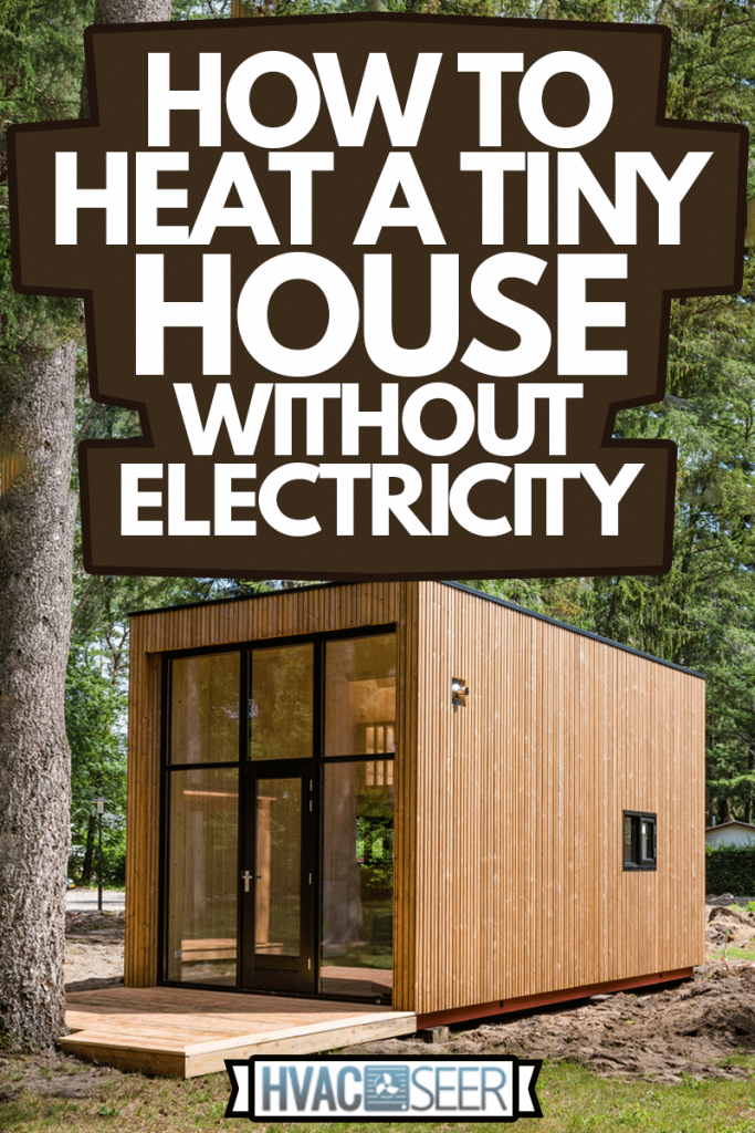 Wooden tiny house under construction. A new form of living philosophy to reduce ecological footprint, How To Heat A Tiny House Without Electricity