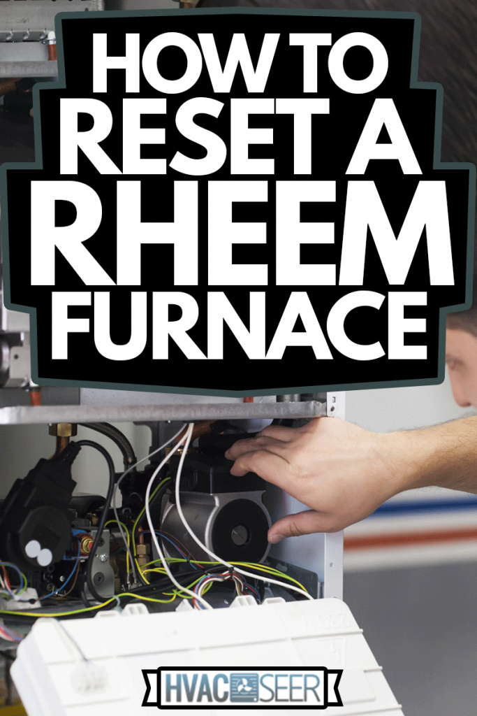 Technician servicing heating boiler, How To Reset A Rheem Furnace