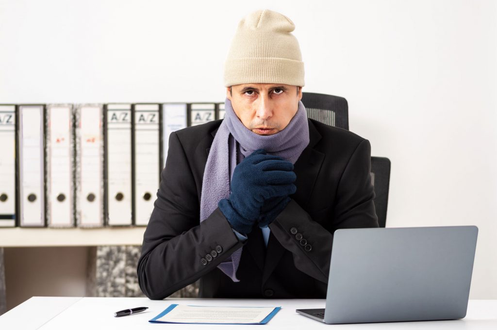 Portrait shot of a angry businessman having cold at office
