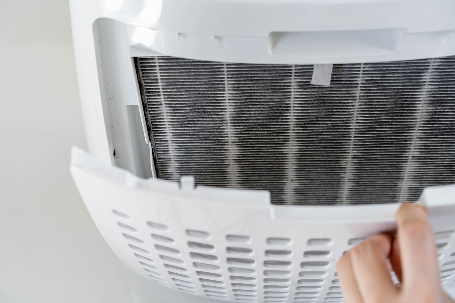 Replacing the air filter of a portable air conditioning unit