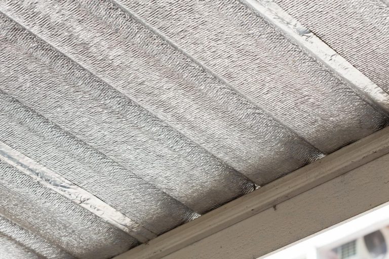 A silver foil insulation on ceiling roof house, How Much Air Gap Do You Need For Radiant Barrier?