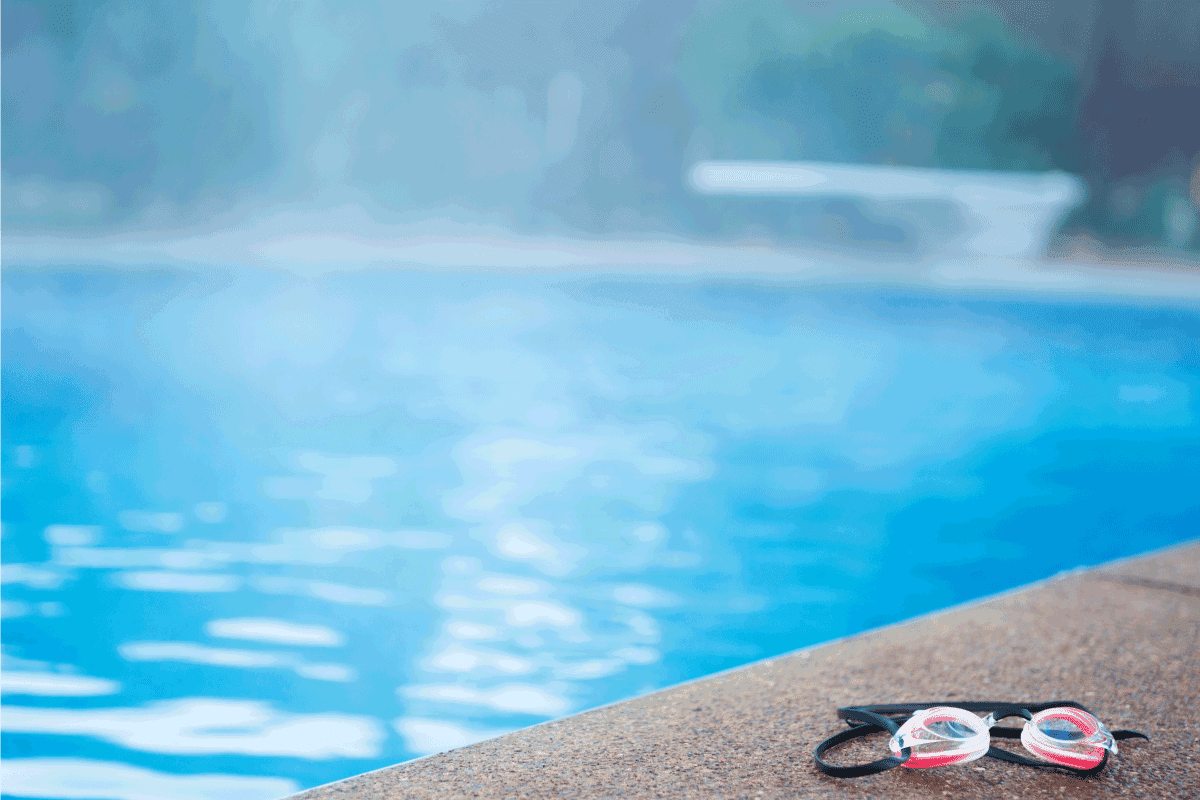Steamy mist rises from heated swimming pool on a cold Autumn day. Pool Heater Leaking From Side - What's Wrong