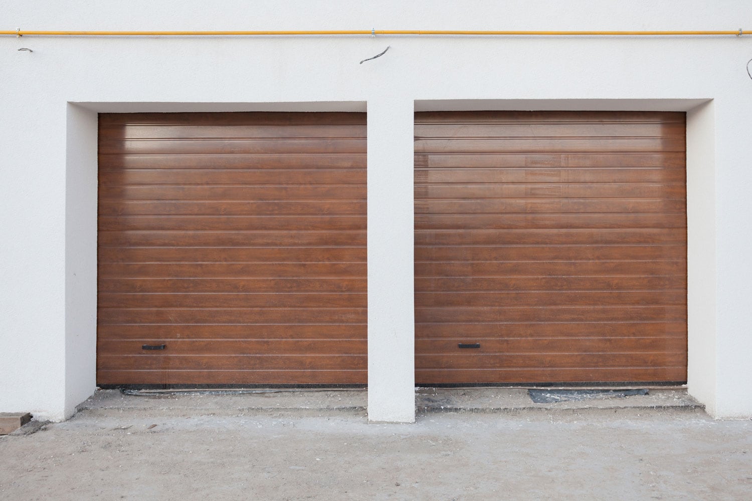 Two wooden garage doors for two cargo garage door