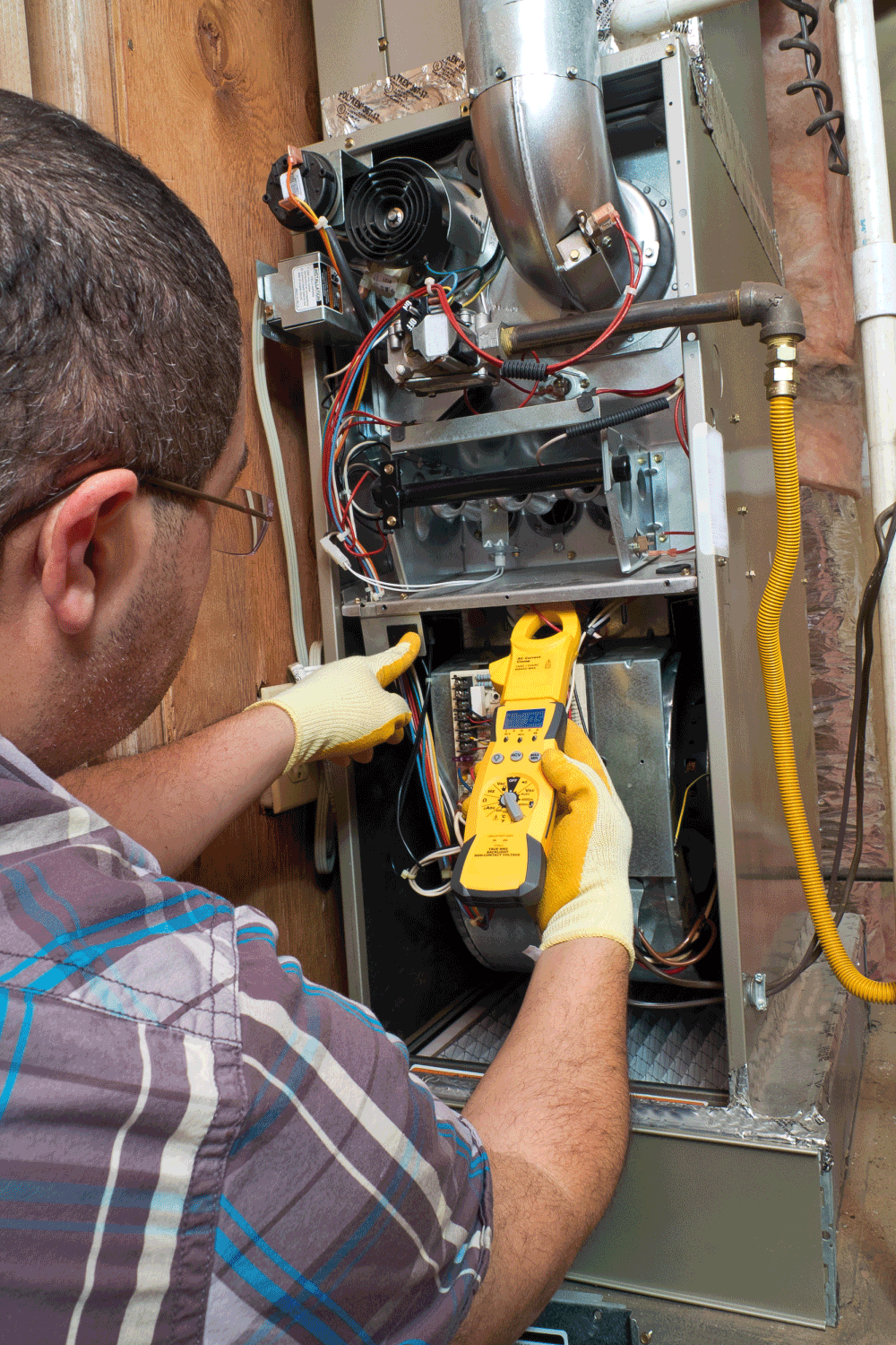 handyman repairman conducting residential HVAC repair