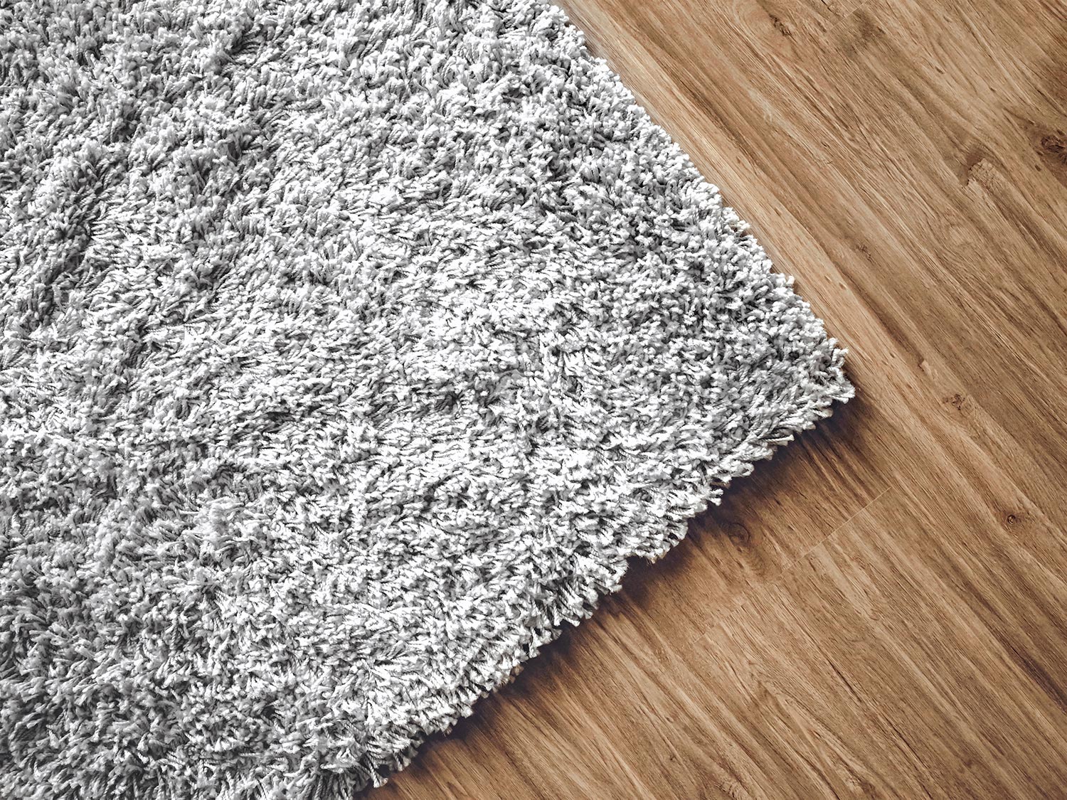Carpet on parquet floor