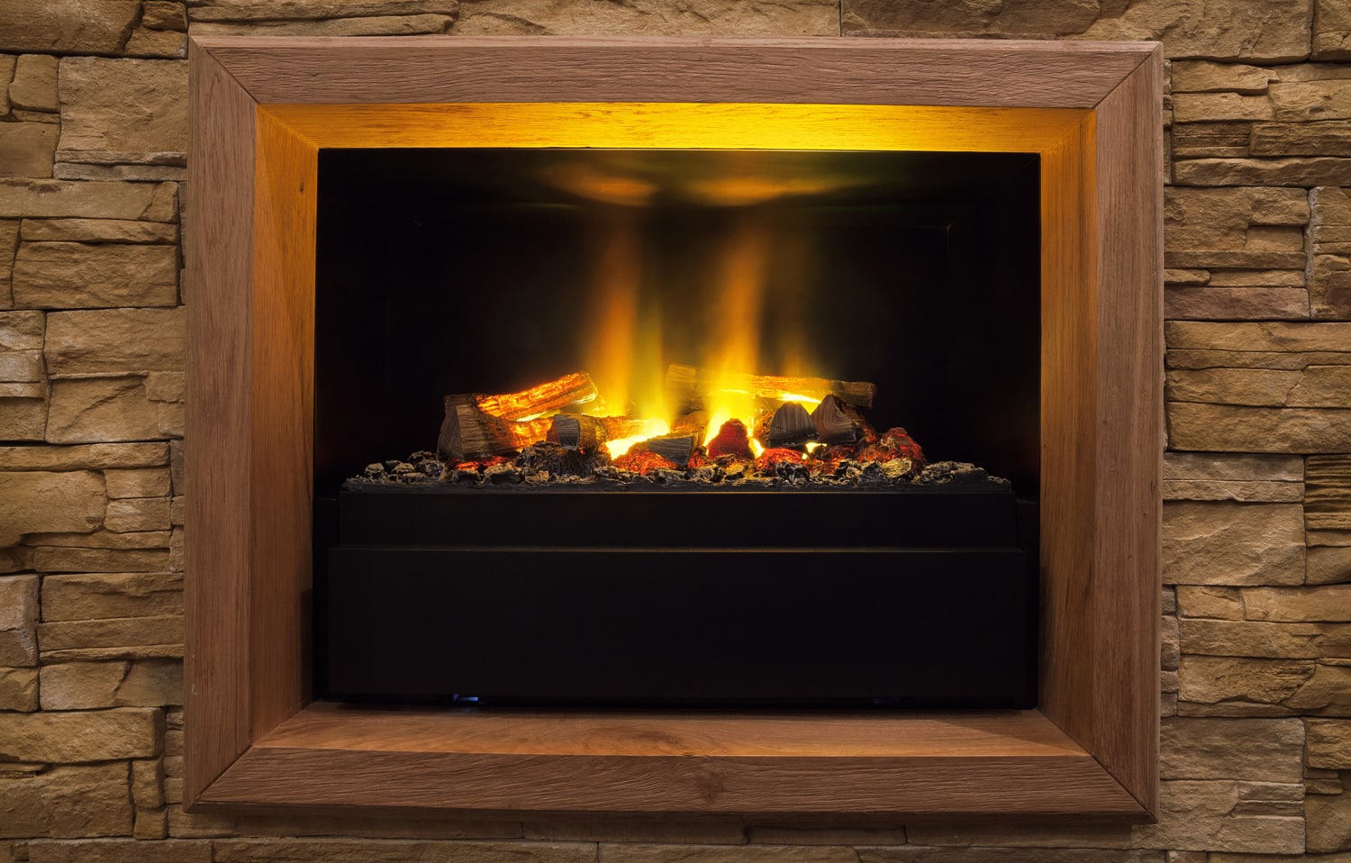 Home interior decor, details of modern artificial fireplace.