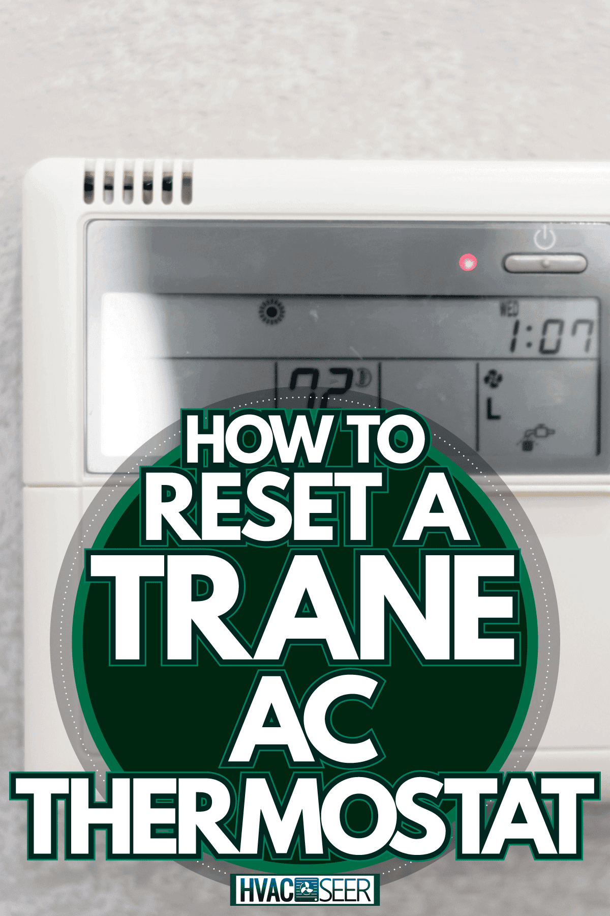 A trane thermostat set to 72 degrees mounted on the wall, How To Reset A Trane AC Thermostat