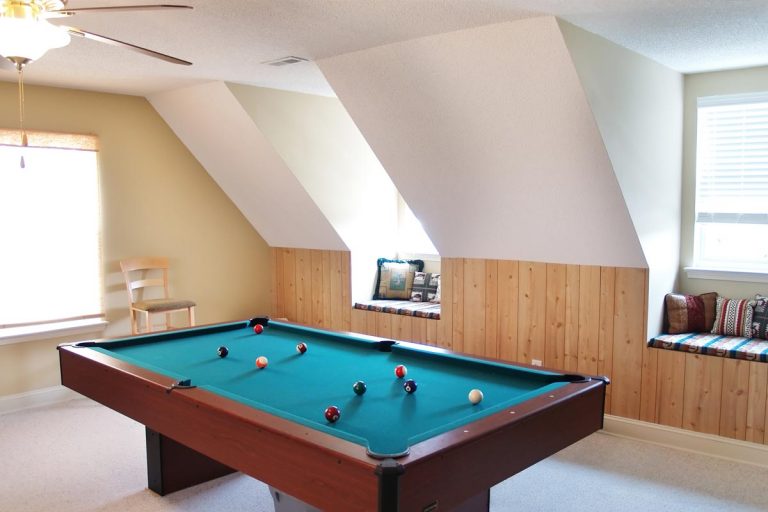 A pool table in a bonus room in a modern American luxury home, How To Cool Bonus Room Above Garage