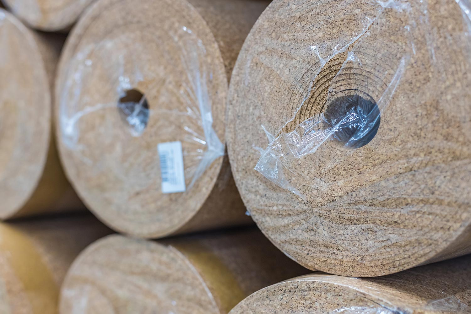 Rolls of thermal insulation from pressed brown cork in the package