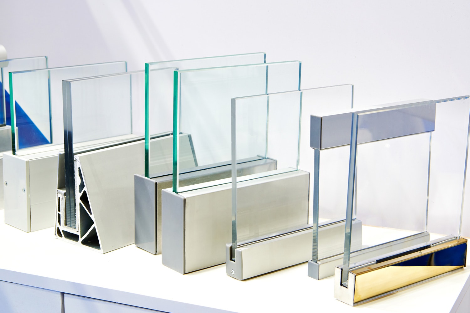 Samples of thick glass in frames in the exhibition store business