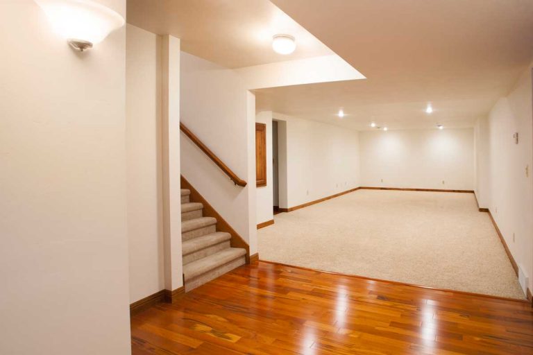 Spacious finished basement with carpet and hardwood floors, Basement Too Hot - Why And How To Fix This