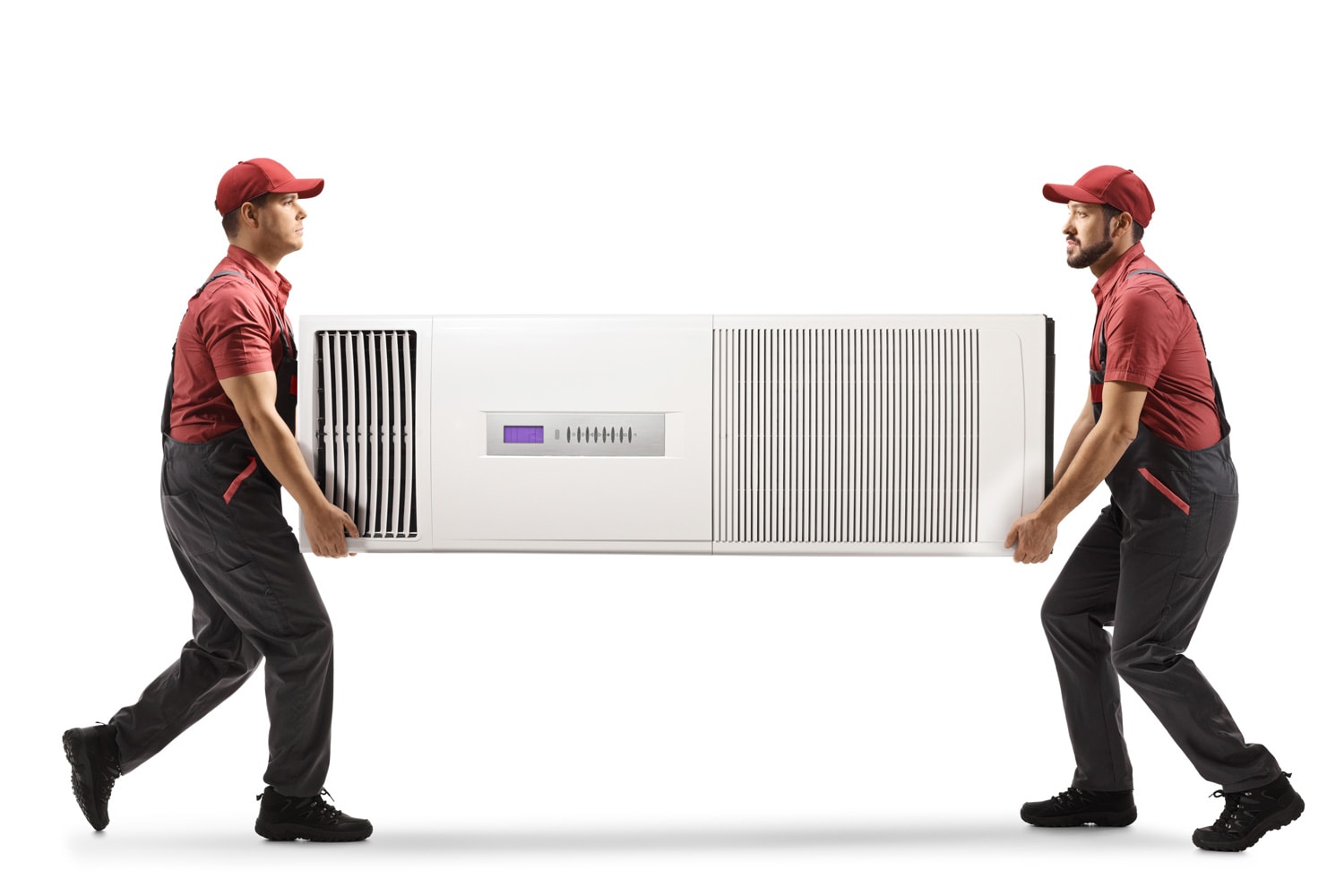 Workers carrying a self standing portable air conditioning unit isolated on white background