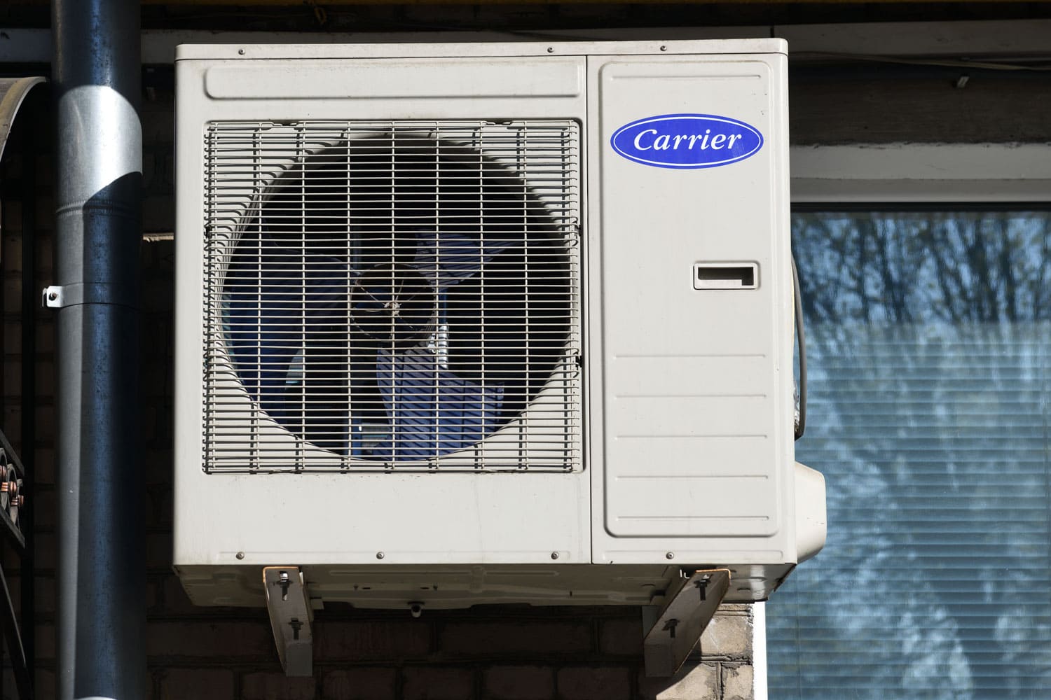 A carrier air conditioning unit mounted on reinforced brackets