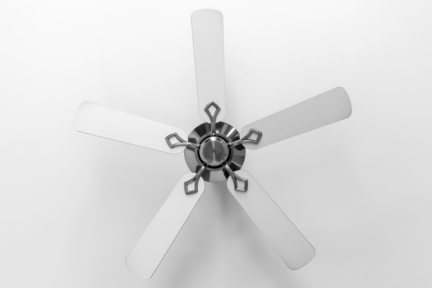 A white metal stainless steel ceiling fan