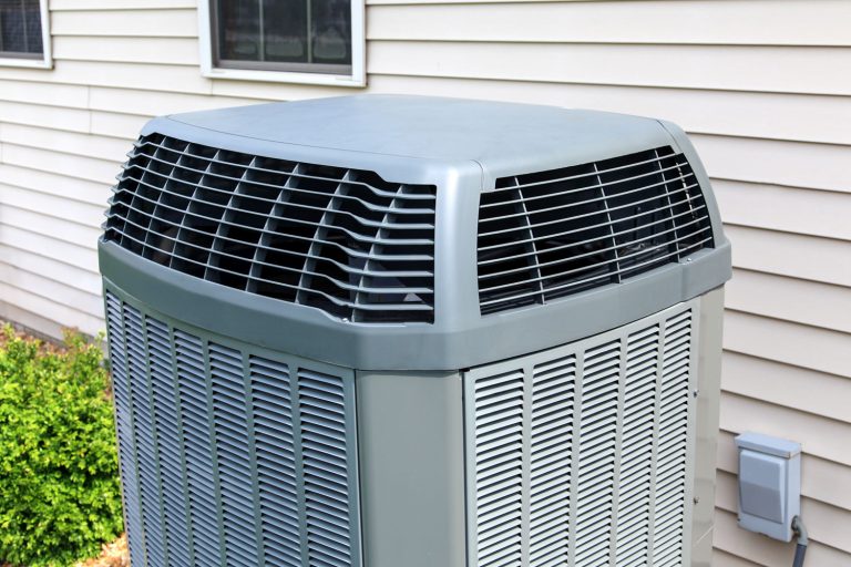 An AC unit on the back of the house, Do Air Conditioners Filter Smoke?