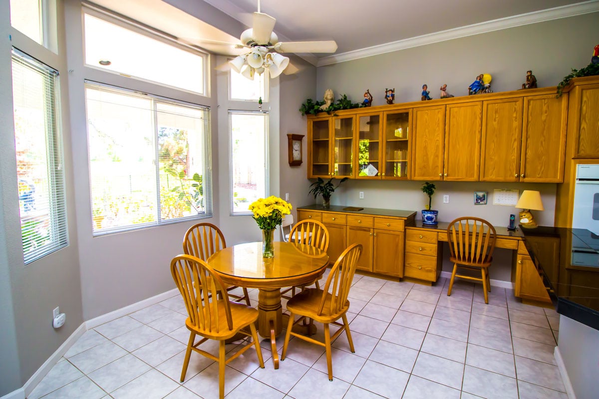 Bay Window Kitchen Eating Area With Wooden Table