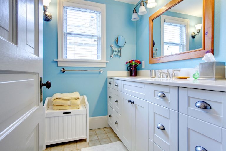 Bright nautical inspired bathroom with white cabinets on the vanity, Bathroom Window: Open Or Closed?