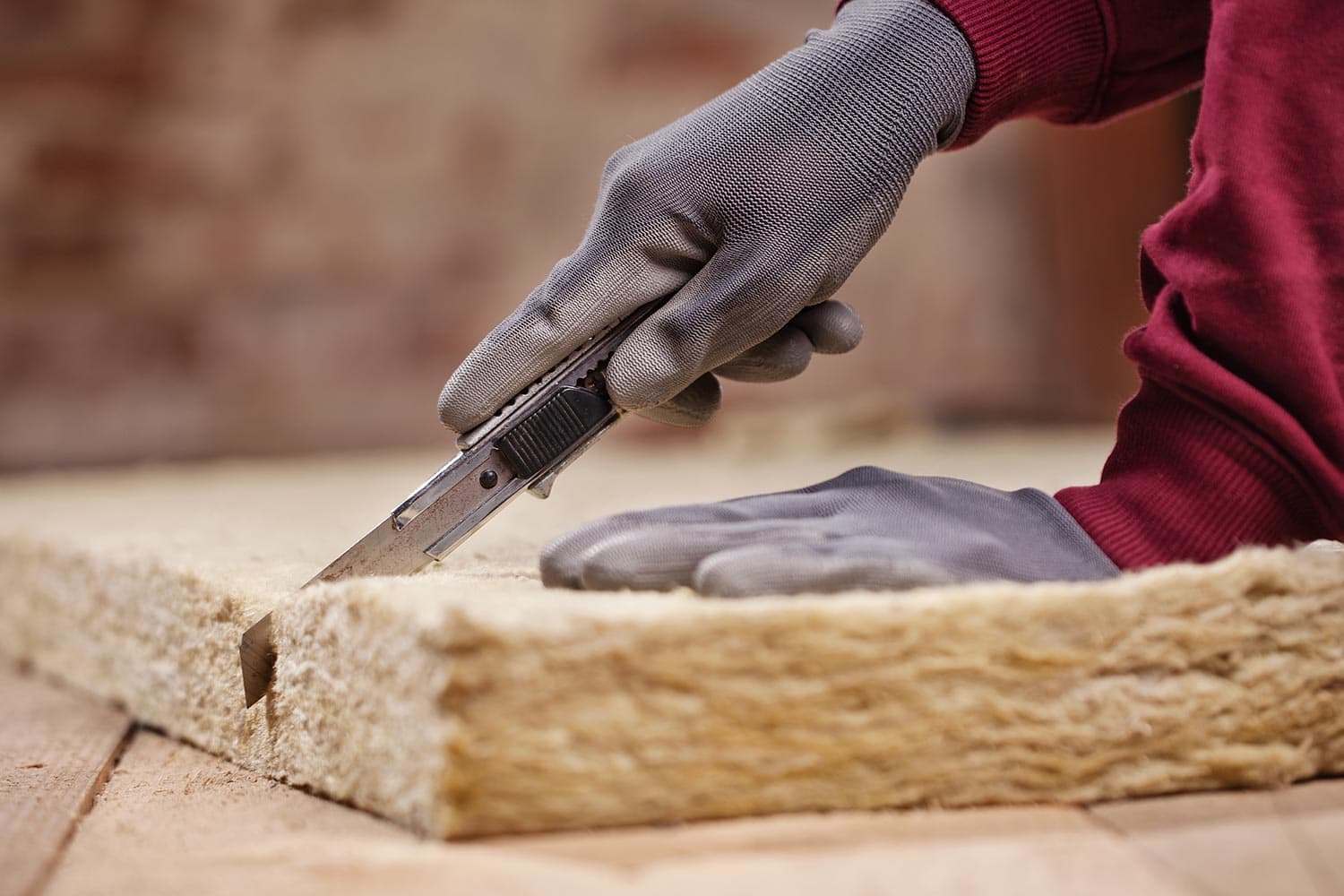 Cutting Mineral wool with utility knife