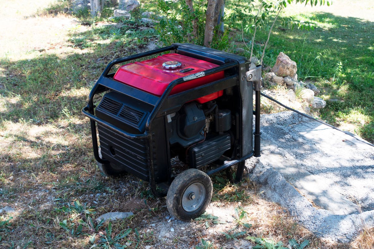 Portable electric generator running in the cold winter