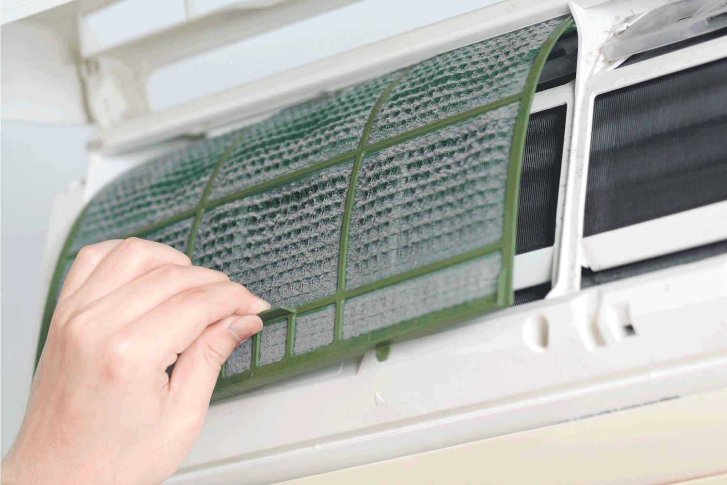 Removing dirty air-conditioner filter for washing