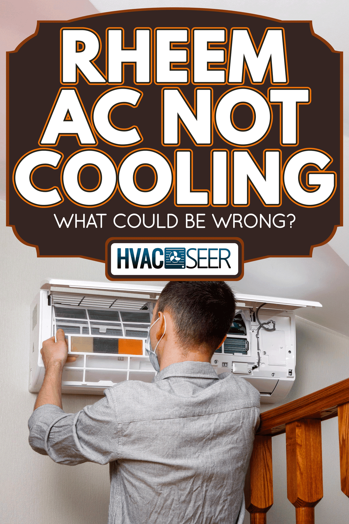 Male technician cleaning air conditioner indoors, Rheem AC Not Cooling - What Could Be Wrong?