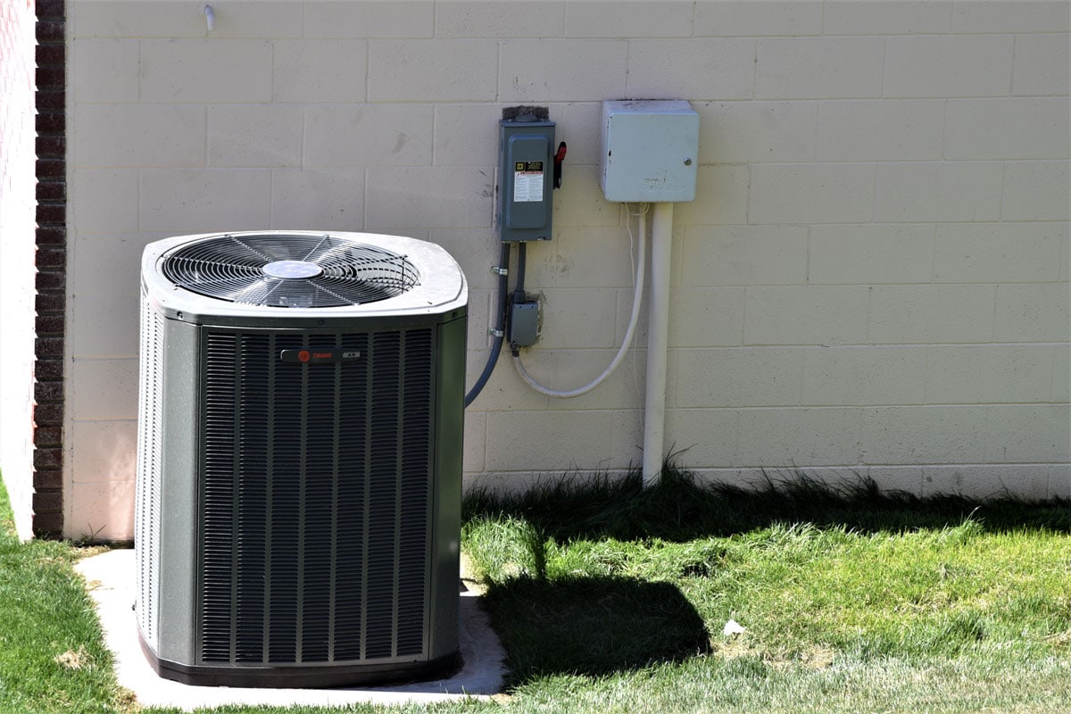 Trane air conditioner on ground Tempe Arizona