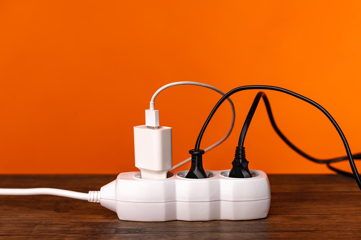 White extension cord with three plugs