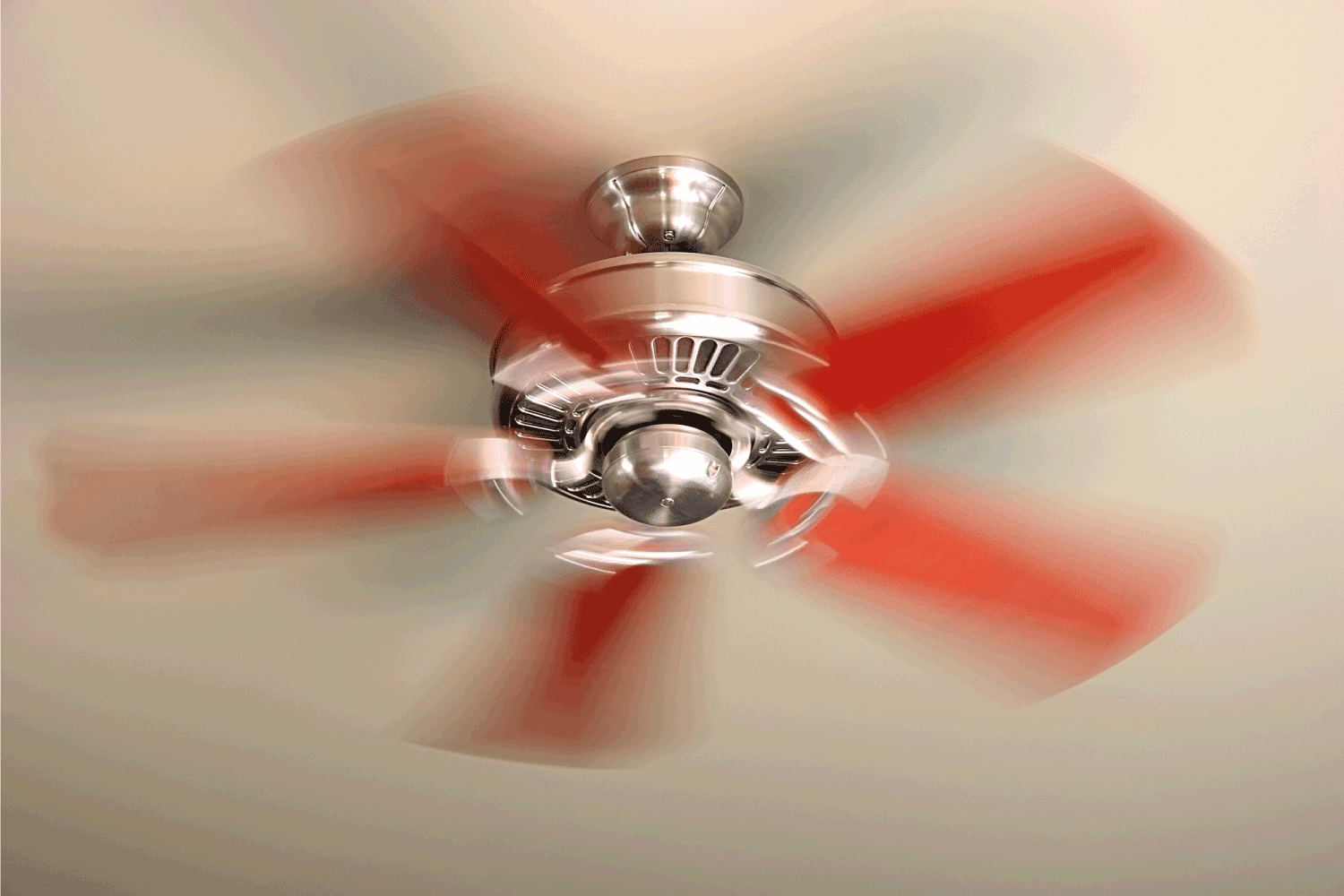 moving blades of an electric ceiling fan