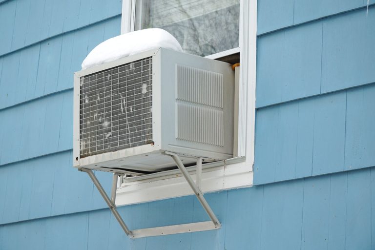 old air conditioner installed on house window after winter snow, Can You Use A Window Air Conditioner Inside A Room?