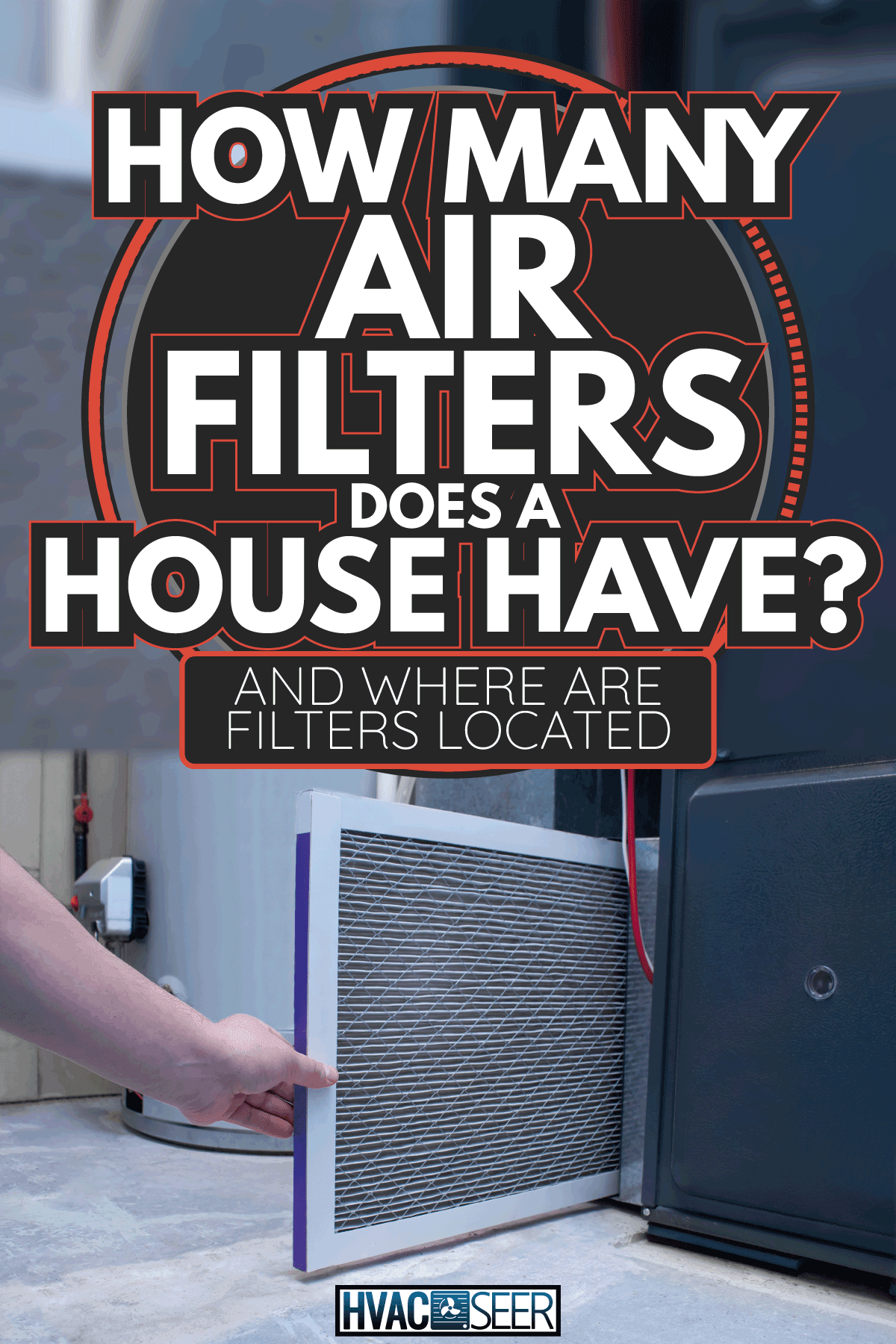 A person changing an air filter on a high efficiency furnace. How Many Air Filters Does A House Have [And Where Are Filters Located]