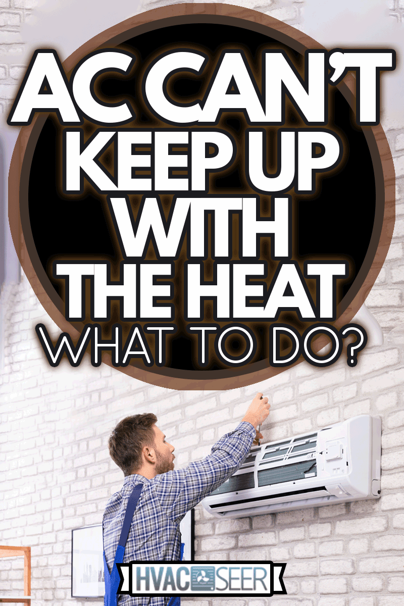 Male Technician Repairing Air Conditioner Mounted On Brick Wall, AC Can't Keep Up With The Heat—What To Do?