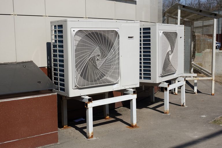 AC condensers mounted on metal brackets, How To Clean A GE Air Conditioner?