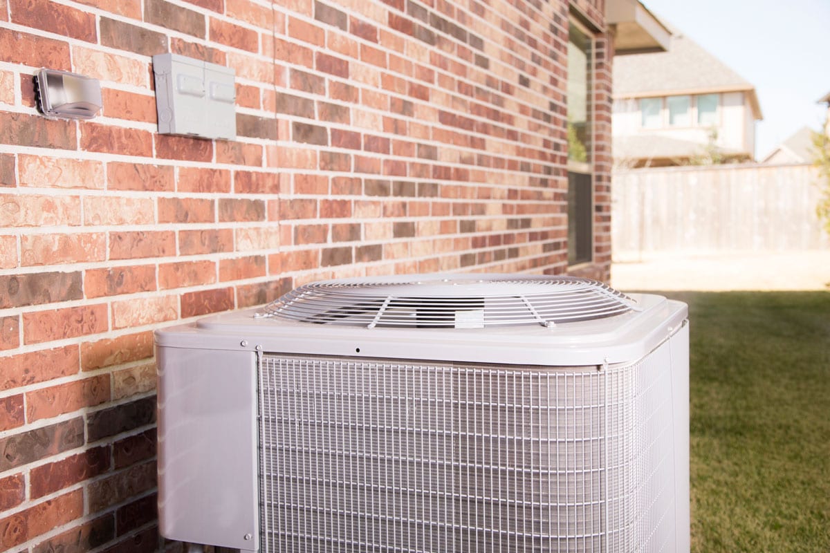 Air Conditioner Unit Outisde a residency type of home
