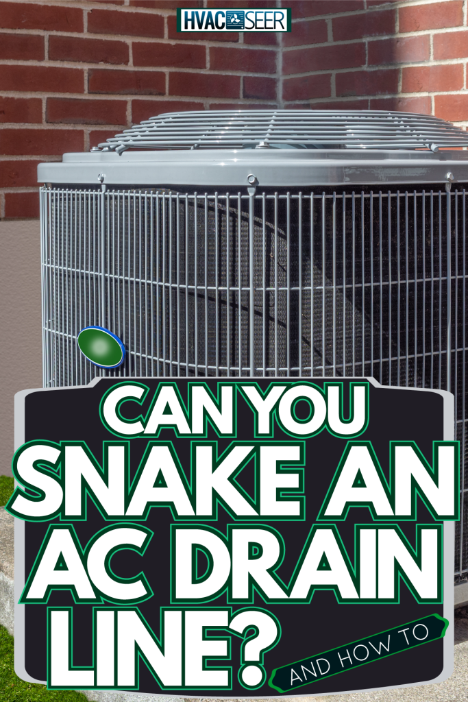 Lennox air conditioning unit on the back of a house, Can You Snake An AC Drain Line? [And How To]