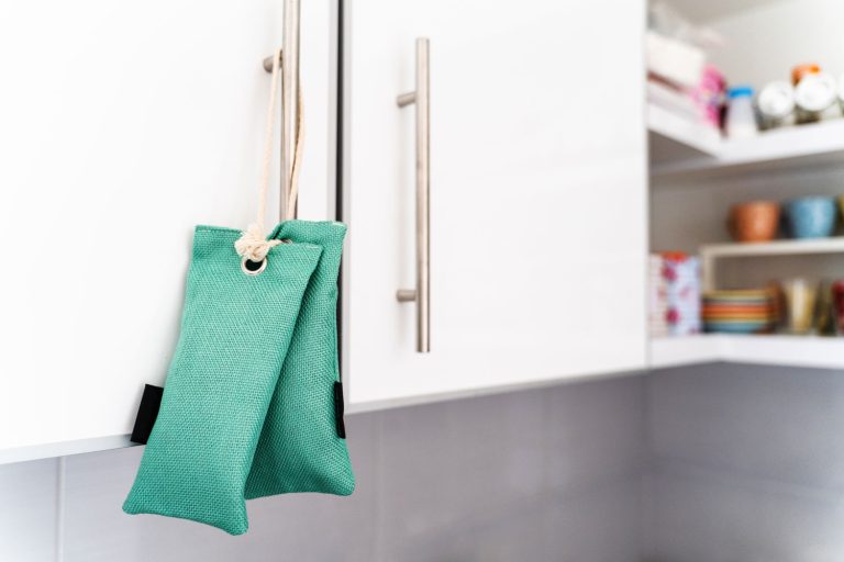 Charcoal bags hanged on the kitchen cabinet, Do Nature Fresh Bags Remove Dust?