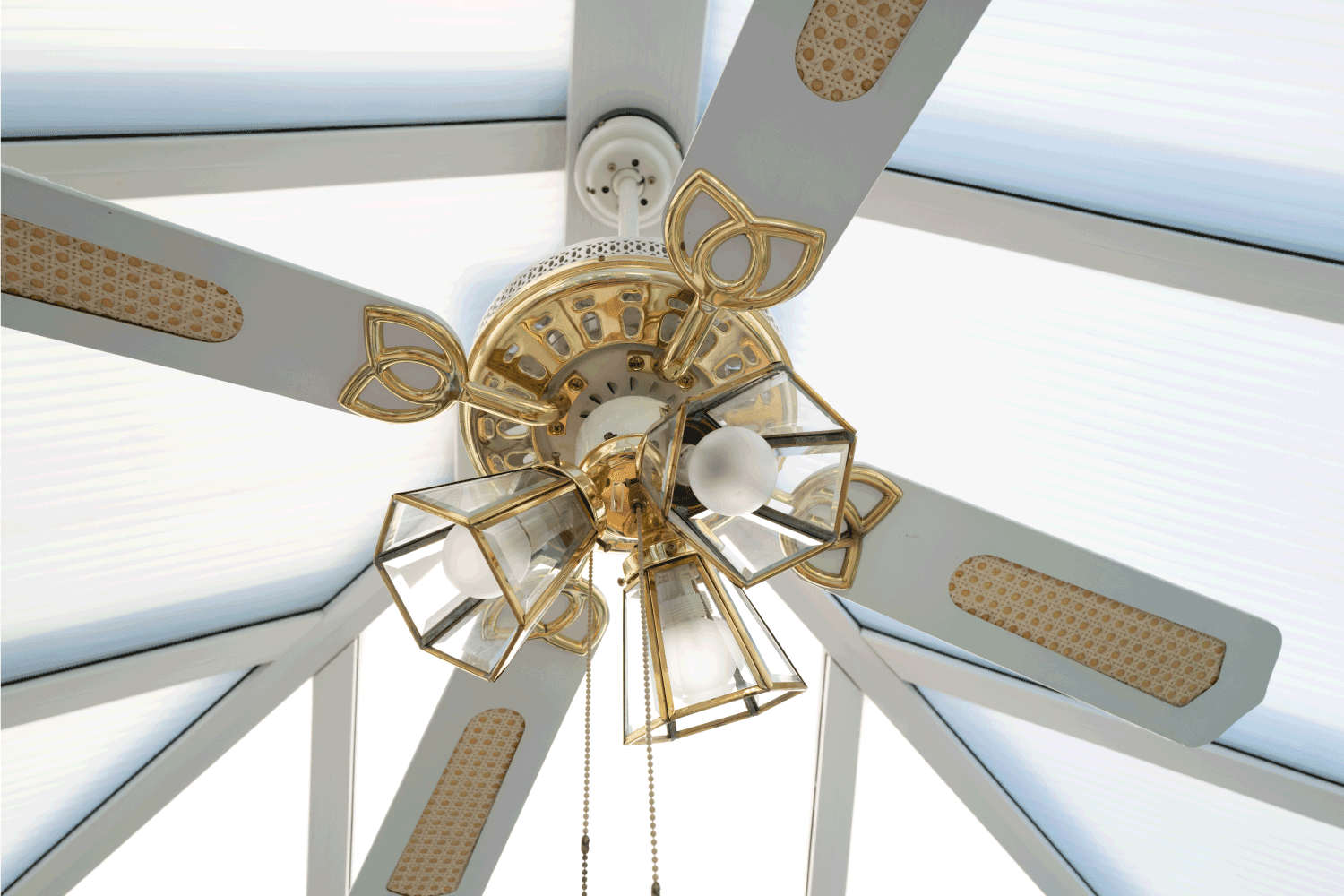 Electric conservatory ceiling fan and combined lighting system seen attached to the sub-frame