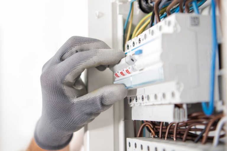 Electrician Wearing Gloves Doing testing in Circuit Breaker, What Size Breaker For 3 Ton AC?