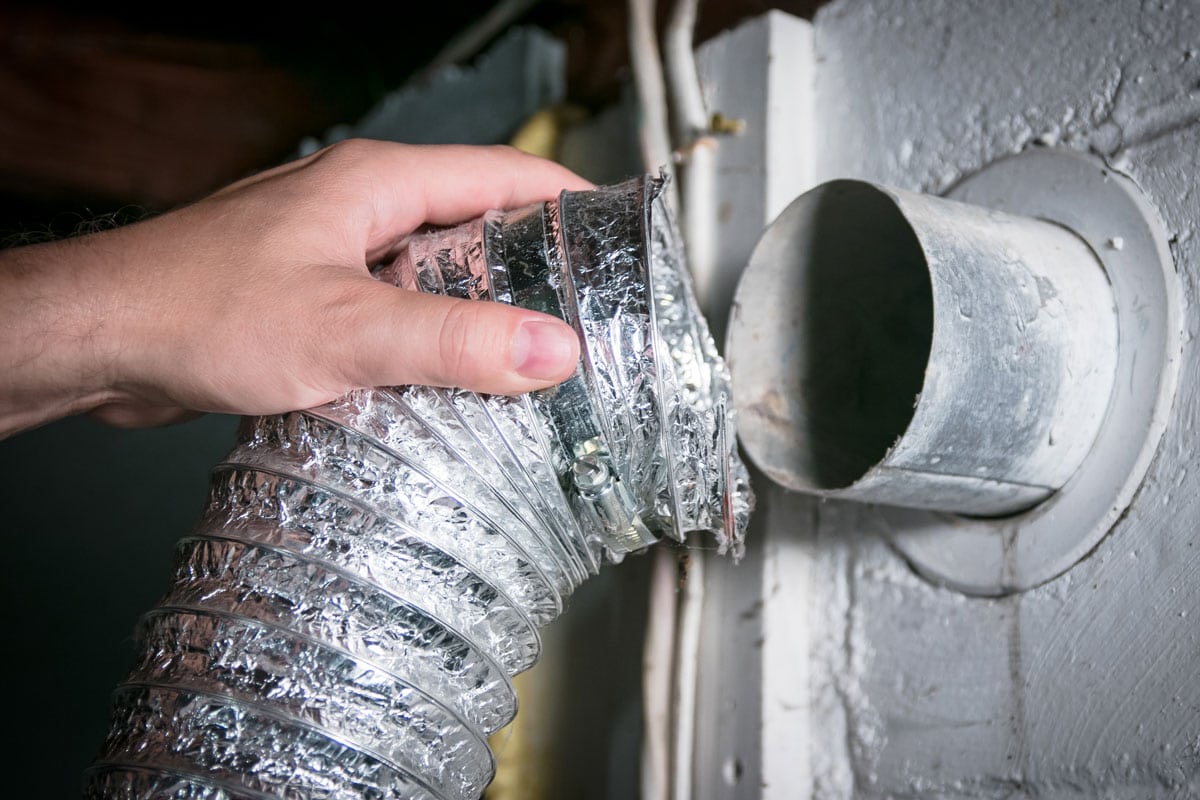 Flexible aluminum dryer vent hose, removed for cleaningrepairmaintenance