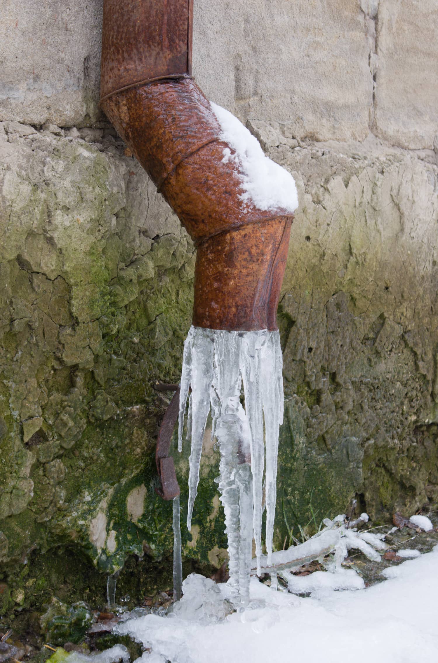 Frozen drainpipe in a wall