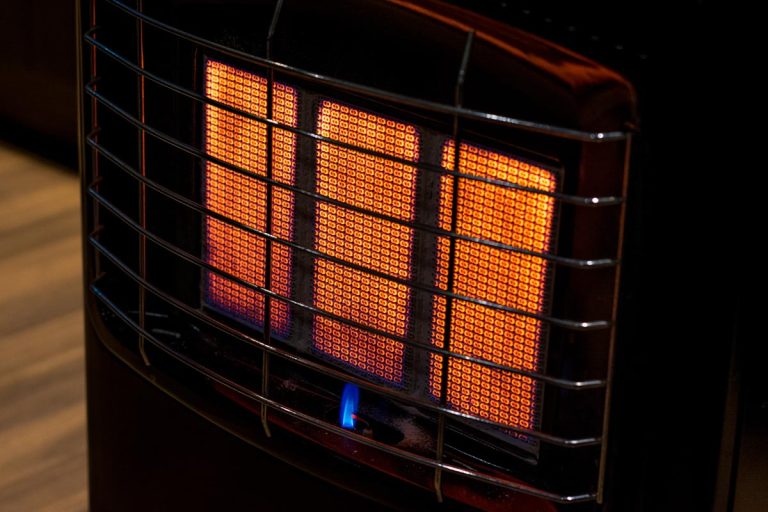 A gas heater on a freezing cold winter night burning at full capacity, Can You Use Mr Buddy Heater Indoors? [Inc. In A Camper]
