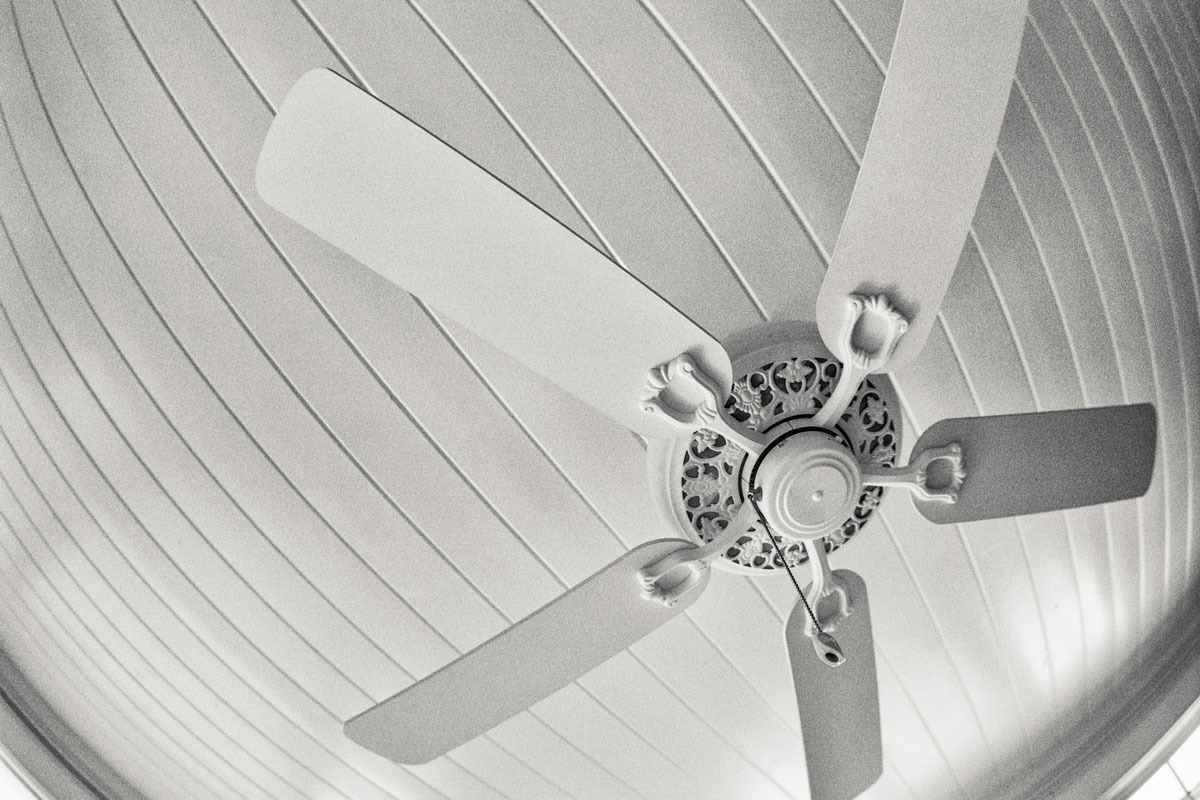 Rustic ceiling fan in a cottage home interior