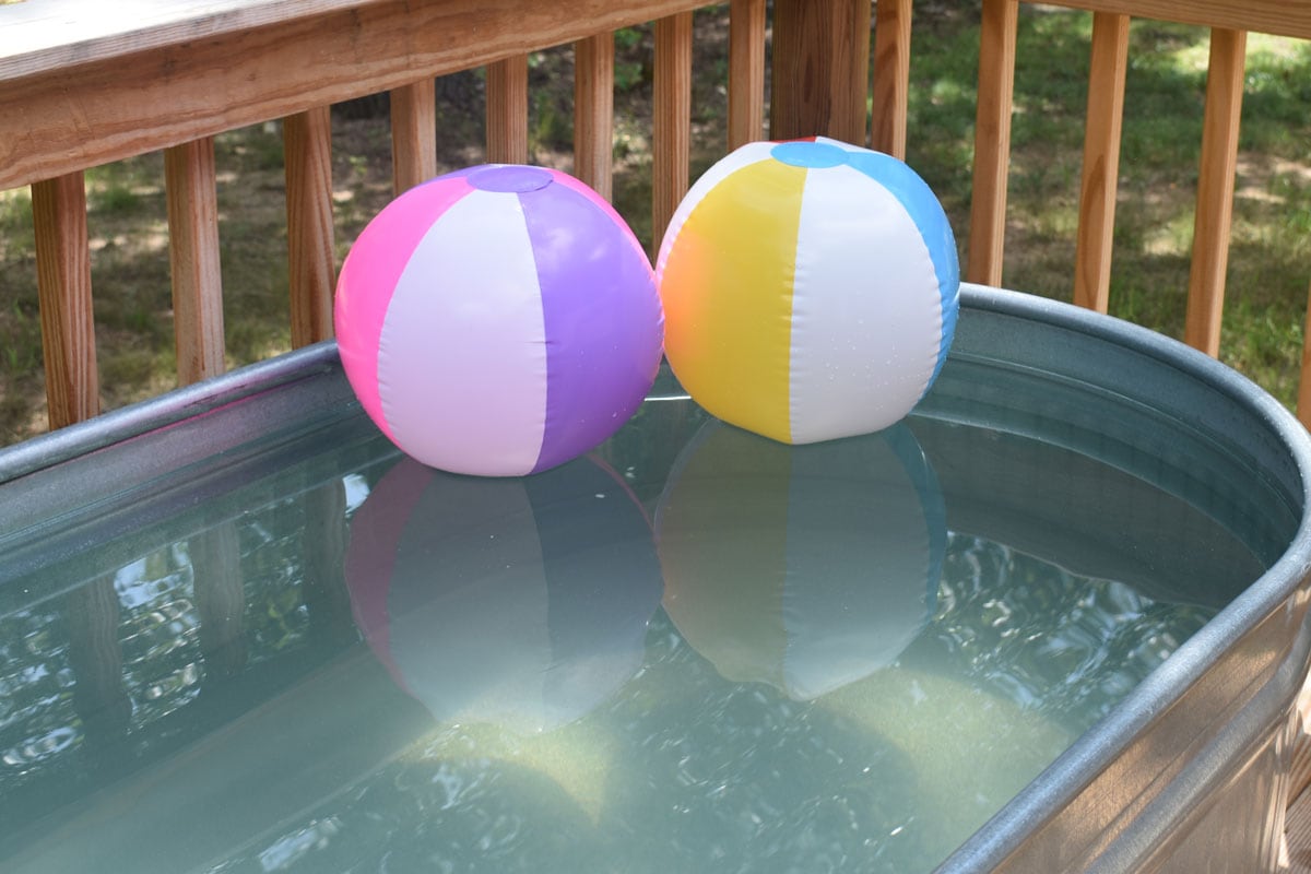 Two ball floating on a stock pool tank