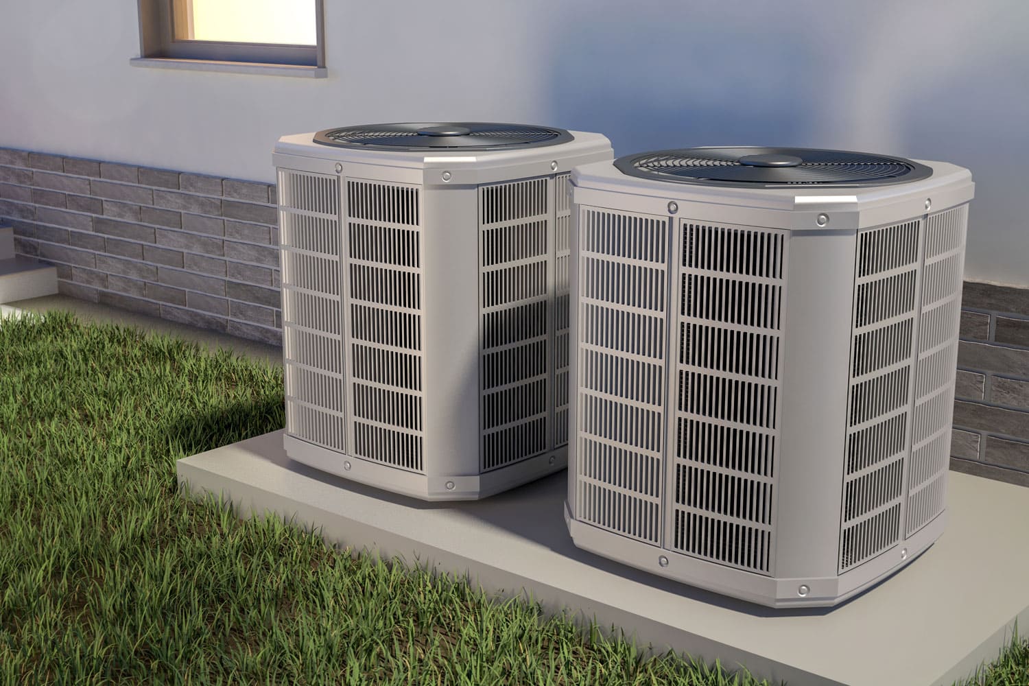 Two heat pumps mounted on concrete slabs