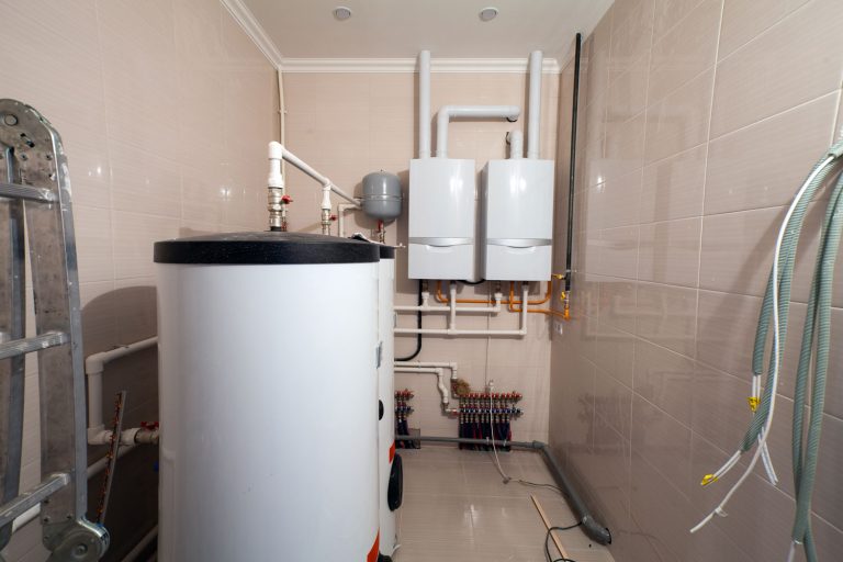 Water heating equipment's inside a boiler room, How Much Does It Cost To Move Water Heater?