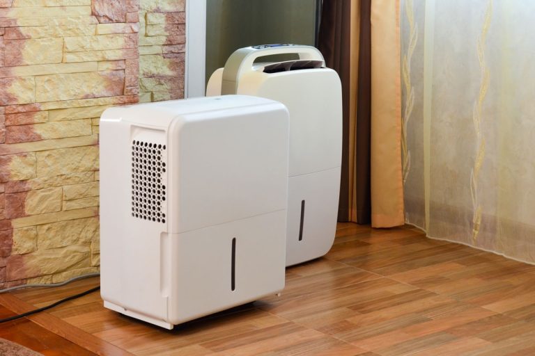 new modern technology for drying air in apartments and houses, dehumidifier, control panel and screen, industrial drying equipment, Can A Dehumidifier Be Too Big For Your Home?