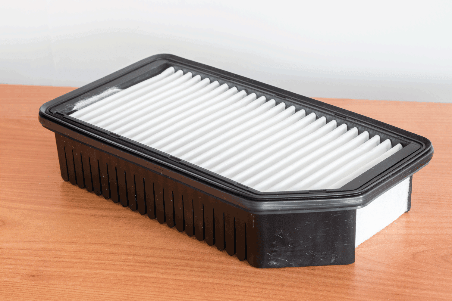 spare hepa filter on top of a wooden table