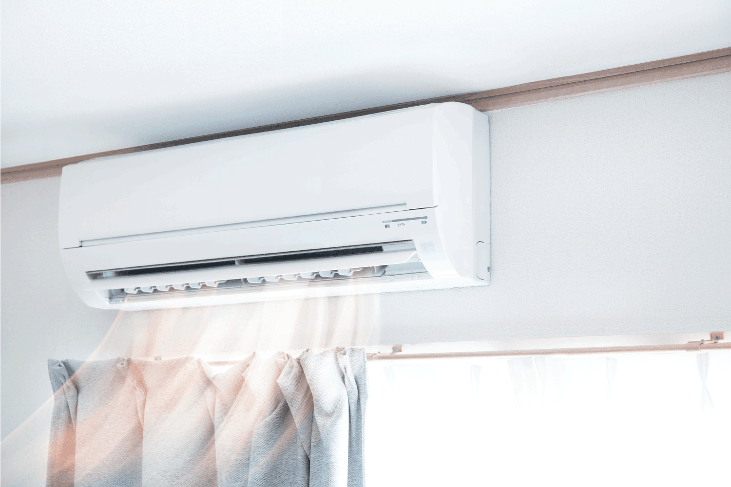 split type air conditioner blowing air into a room